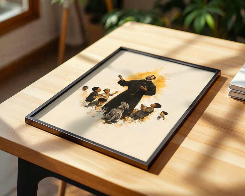 May include: A framed art print featuring a watercolor-style illustration of a figure in a black robe with a cross, surrounded by several children and a dog, set against a soft yellow halo background on a light-colored paper surface.