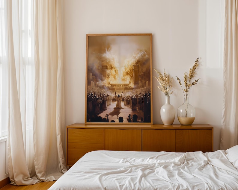 May include: A framed rectangular wall art print depicting a large crowd gathered before a central figure with raised arms, set against a backdrop of golden light and towering structures, displayed on a wooden sideboard with two glass vases.