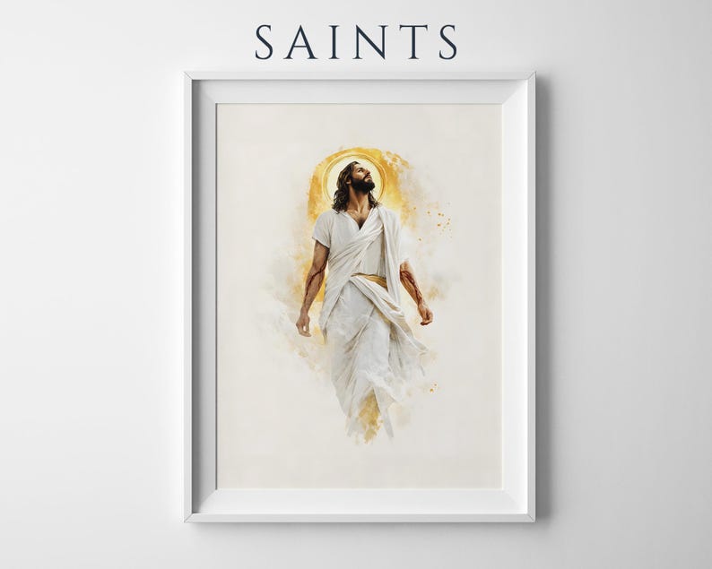 Puede incluir: Una impresi&oacute;n de arte de pared enmarcada con la palabra SAINTS en la parte superior. La obra muestra una figura con cabello oscuro largo y barba, vistiendo t&uacute;nicas blancas, mirando hacia arriba con un efecto de halo dorado detr&aacute;s de la cabeza.