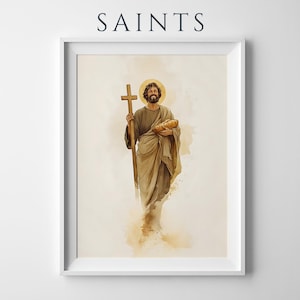 Peut inclure: Une impression d'art encadr&eacute;e intitul&eacute;e SAINTS repr&eacute;sentant une illustration &agrave; l'aquarelle d'un personnage barbu en robe beige tenant une croix en bois et un pain. Le personnage a une aur&eacute;ole dor&eacute;e sur un fond neutre et doux.