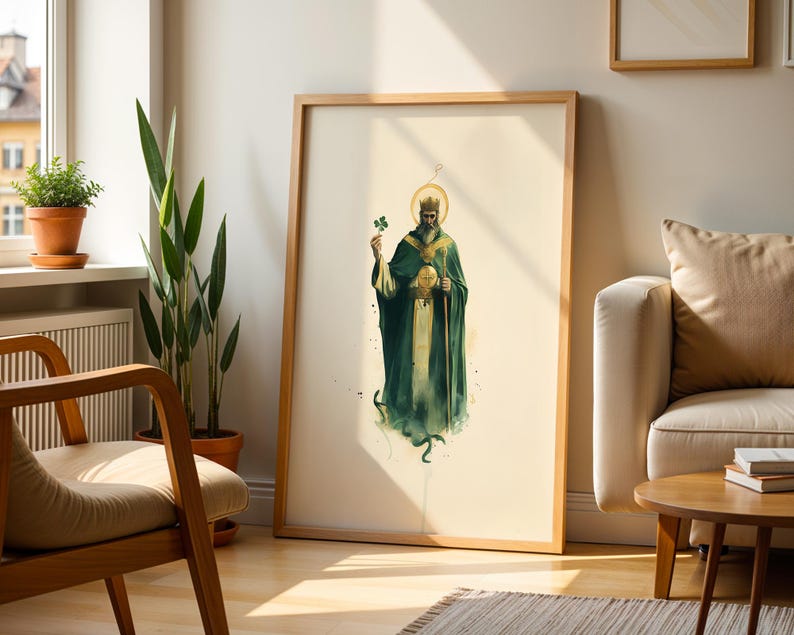 May include: A framed vertical wall art print featuring a bearded figure wearing a crown and a long dark green robe, holding a shamrock in one hand and a staff in the other, with a golden halo behind the head, set against a cream background.