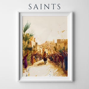 Peut inclure: Une impression d'art encadr&eacute;e intitul&eacute;e SAINTS repr&eacute;sentant une illustration &agrave; l'aquarelle d'une silhouette montant un &acirc;ne vers une ville. Une foule en robes color&eacute;es borde le chemin, mains lev&eacute;es, entour&eacute;e de palmes et de b&acirc;timents en pierre.
