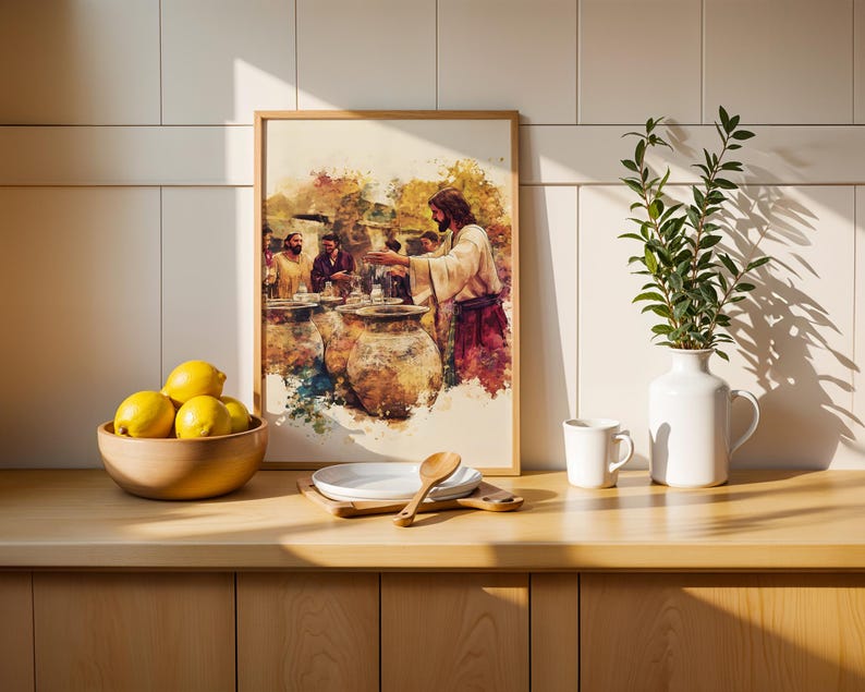 May include: A framed watercolor-style print depicting a biblical scene with figures gathered around large clay jars, set in a light-toned kitchen. The artwork features warm earth tones, including browns, yellows, and reds, capturing a narrative moment.