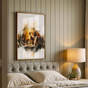 May include: A framed wall art print depicting a group of figures gathered around a table for a meal, with one central figure holding a cup aloft. The artwork features warm golden, brown, and dark tones with a painterly, expressive style.