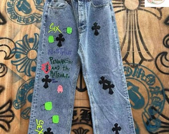 Jeans met graffiti-kruispatch, streetwear-spijkerbroek, trendy urban jeans, casual streetstyle-broek