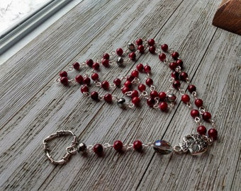 Barbed Wire Heart Rosary with Floral Skull, Dark Red Glass Marble Beads, and Metallic Silver Crystal & Iridescent Barrel Bead Accents