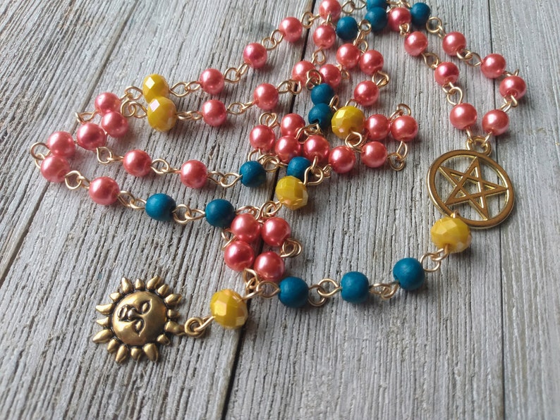 Helios Rosary with Golden Sun, Pentacle, Coral Glass Pearls, Teal Painted Wood Beads, & Yellow Crystal Accents, Hellenic Sun God image 1