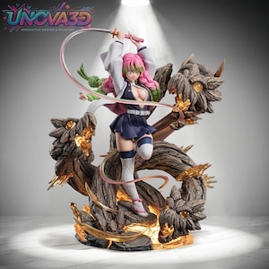 May include: A detailed anime-style figurine of a character with pink and green hair, wearing a dark blue uniform and white jacket, wielding a long, thin, curved sword. The figure stands amidst a large, textured, brown wooden dragon-like structure.