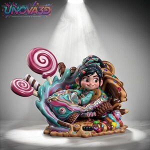 May include: A 3D printed figurine of a character with black hair in a ponytail, wearing a teal hoodie, driving a candy-themed race car. The scene features pink swirl lollipops, chocolate accents, and colorful sprinkles on a textured base.