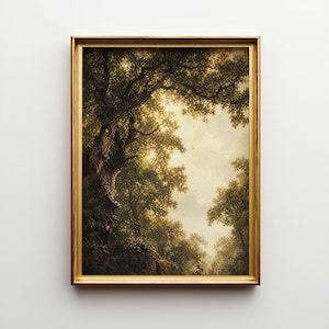 May include: A framed landscape painting featuring a forest scene with sunlight filtering through the trees. The artwork has a gold-colored frame. The painting depicts a lush forest with detailed foliage and a bright sky.