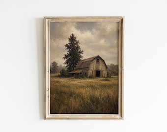 May include: A framed landscape painting depicting a weathered wooden barn situated in a golden field of tall grass. A tall evergreen tree stands beside the barn under a cloudy, overcast sky. The frame is a light-toned wood with a simple profile.