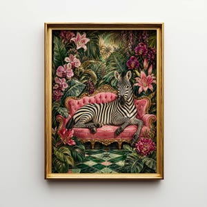 May include: A framed art print featuring a zebra reclining on a pink sofa amidst lush tropical foliage. The artwork showcases a vibrant color palette with pink, green, and gold accents, creating a whimsical and elegant aesthetic.