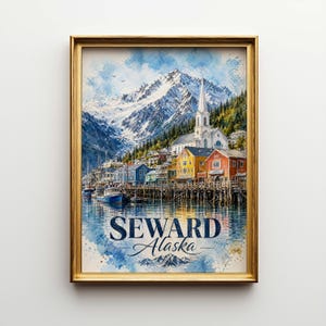 May include: A framed watercolor print of Seward, Alaska, featuring a harbor with colorful buildings, boats, and a church against a backdrop of snow-capped mountains. The text "SEWARD Alaska" is displayed at the bottom.