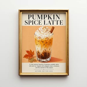 Peut inclure: Une affiche encadrée représentant un Pumpkin Spice Latte. L'image montre un grand verre rempli de couches de café, de crème fouettée et d'un bâton de cannelle. Le texte en haut indique "PUMPKIN SPICE LATTE". Le texte en bas indique "AUTUMN EDITION 2025".