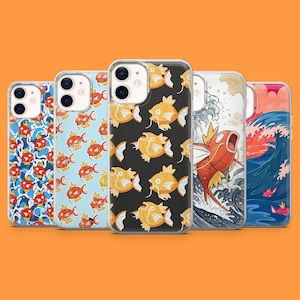 May include: Five phone cases with different designs. The cases display patterns of orange and red fish, a black background with yellow fish, and a Japanese-inspired wave design with a red fish. The cases are set against an orange background.
