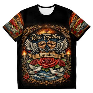May include: A black short-sleeve t-shirt featuring a graphic print with the text Rise Together and Equality. The design includes two raised fists connected by a chain, wings, red roses, two white doves, and two lit torches within an ornate frame.