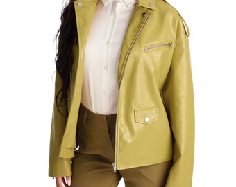 May include: A chartreuse faux leather jacket featuring a notched collar, a silver-toned front zipper, a diagonal zippered chest pocket, and a small flap pocket with a silver snap button closure. The jacket is worn over a white button-down shirt.