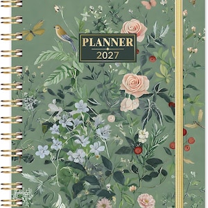 May include: A sage green spiral-bound planner for 2027 featuring a botanical illustration of pink roses, small blue flowers, various green leaves, red berries, and several butterflies and a small bird scattered across the front cover.