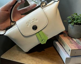 Longchamp Le Pliage Xtra XS White Crossbody Bag, Soft Leather Mini Handbag, Adjustable Strap, Compact Designer Purse, Chic Everyday Bag