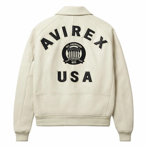 May include: Cream-colored leather jacket with a classic collar and ribbed cuffs. The back features the word "AVIREX" arched across the top, with a circular emblem in the center and "USA" below. The emblem includes the text "ALL AMERICANS ESTABLISHED 1975".