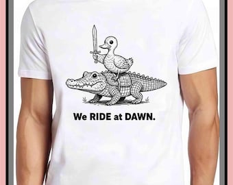 We Ride at Dawn Silly Goose Alligator Ren Faire Cute | Vintage Graphic Tee | Cute Trendy Shirt | Unisex Adult Kid | Aesthetic Gift | GA977