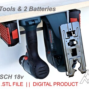 May include: A drill and a jigsaw are mounted under a wooden shelf. Two batteries are also mounted. The tools are black and teal with red accents. The text "2 Tools & 2 Batteries" and "BOSCH 18v" are visible.
