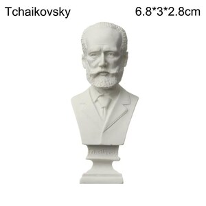 May include: A white bust of Pyotr Ilyich Tchaikovsky, a composer, with the text "Tchaikovsky" above the bust. The bust measures 6.8cm x 3cm x 2.8cm. The bust has a detailed face, beard, and suit.