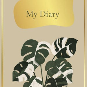 Könnte beinhalten: Ein rechteckiges Tagebuch mit beigem Einband, goldenem Rand und einer zentralen goldenen organischen Form, die den Text My Diary in dunkler Schrift enthält. Unter dem Text befindet sich eine grafische Darstellung einer Monstera-Pflanze.