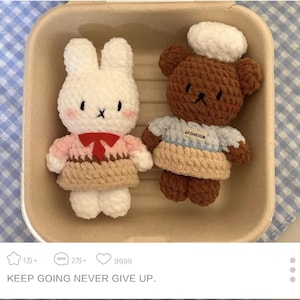 May include: Two handmade crochet dolls: a white bunny with a pink and brown outfit and a brown bear wearing a blue and tan outfit. The text "KEEP GOING NEVER GIVE UP" is at the bottom of the image.
