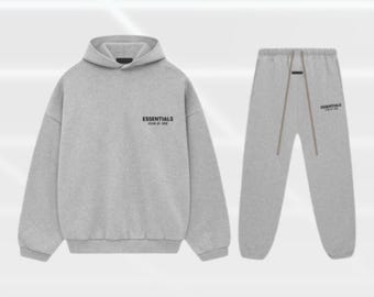 Conjunto deportivo gris extragrande, estilo urbano minimalista de lujo, sudadera con capucha.