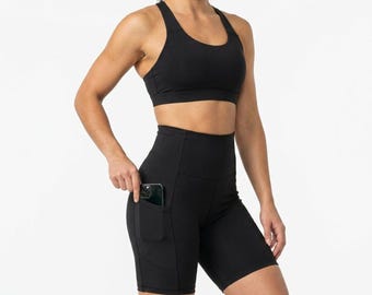 Pantalones cortos de ciclista de talle alto con bolsillos – Pantalones cortos elásticos para mujer para entrenar y practicar yoga.