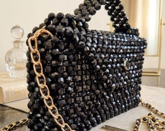 Élégant sac à perles fait main avec Kleeblatt-Verschluss en noir