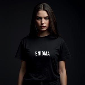ENIGMA Shirt • Minimalist Graphic Tee • Mysterious Aesthetic T‑Shirt • Streetwear Unisex Tee • Bold Typography Shirt • Bella Canvas 3001