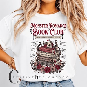 May include: A white t-shirt featuring a graphic print with the text Monster Romance Book Club and Mated. Marked. Mentally Unwell. The design includes a stack of four books, a skull with horns, tentacles, and red roses with green leaves.