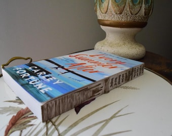 Paperback Every Summer After with unique laser engraved page edges
