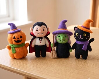 Statuette di feltro fatte a mano per Halloween: zucca, vampiro, strega, gatto nero.