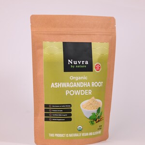 May include: A brown paper bag of organic Ashwagandha root powder. The label features the brand name "Nuvra by nature" and details about the product, including "Also known as Indian Ginseng" and "Certified USDA Organic". The product is described as naturally vegan and gluten-free.