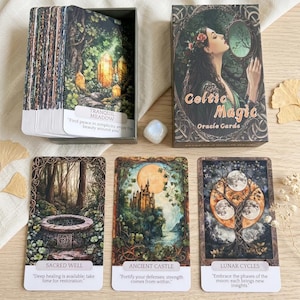 May include: A deck of Celtic Magic oracle cards featuring a box with an illustration of a person holding a mirror, and three cards displayed showing a stone well, a castle under a full moon, and a tree with moon phases, all with text labels.