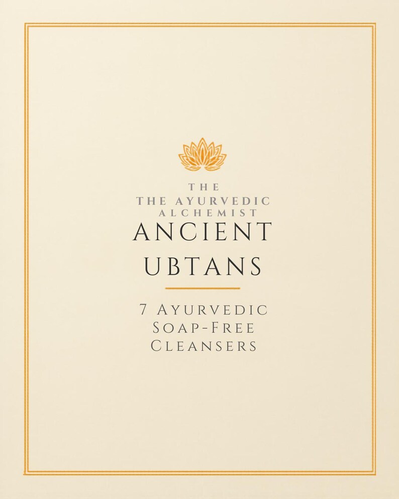 May include: A cream-colored rectangular product label featuring a gold lotus icon at the top. The text reads: THE THE AYURVEDIC ALCHEMIST ANCIENT UBTANS 7 AYURVEDIC SOAP-FREE CLEANSERS. The design is enclosed within a thin gold double-line border.