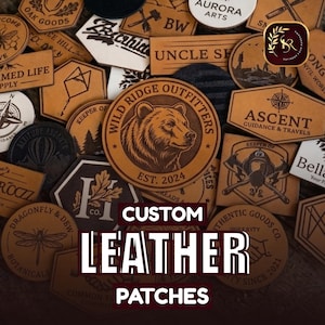 May include: A selection of custom leather patches in different shapes and sizes. The patches showcase designs like a bear, compass, axes, and text. The words "CUSTOM LEATHER PATCHES" are displayed in white text.