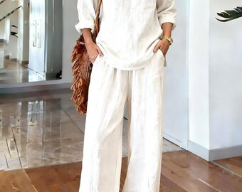 Completo da donna ampio con top e pantaloni, abbigliamento casual coordinato per il tempo libero.