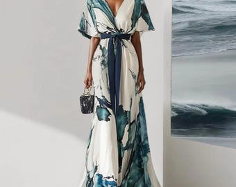 Elegante abito caftano floreale da donna, abito lungo estivo da resort.
