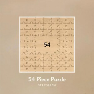 May include: A 54-piece wooden jigsaw puzzle with a light brown finish. The puzzle is square, with a white border, and the number 54 is in the center. The text "54 Piece Puzzle" and the dimensions 33.9 x 34.2 CM are below the puzzle.