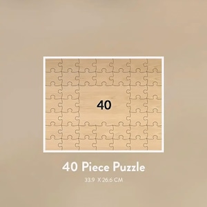 May include: A 40-piece puzzle with a wooden-like design. The puzzle is rectangular, with a white border and the number 40 in the center. The dimensions are 13.3 inches by 10.5 inches.