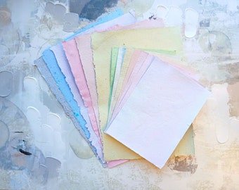 Assorted sheets of handmade recycled paper, eco-friendly, great for paper crafts and hobbies