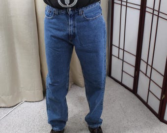 Vintage Levi Jeans 560 Size 8 M Size 30" Waist/ 31.5" Inseam Med Blue Worn In Loose Fit