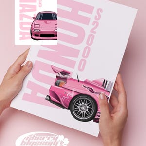 May include: Two pink car prints are displayed. One print features a pink Mazda MX5, and the other showcases a pink Honda S2000. The prints have a white background and the text "2 PRINTS" is visible. The Cherry Blossom Decals logo is also visible.