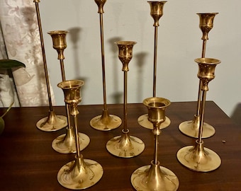 Candelabros cónicos de latón