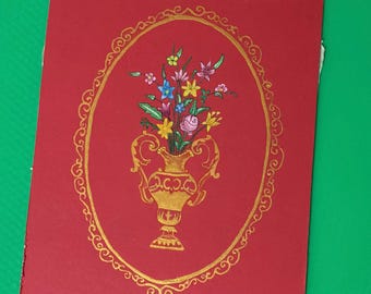 Arte ottomana miniata fatta a mano, vaso dorato con decorazione floreale in stile Tezhip, arte murale turca su sfondo rosso.