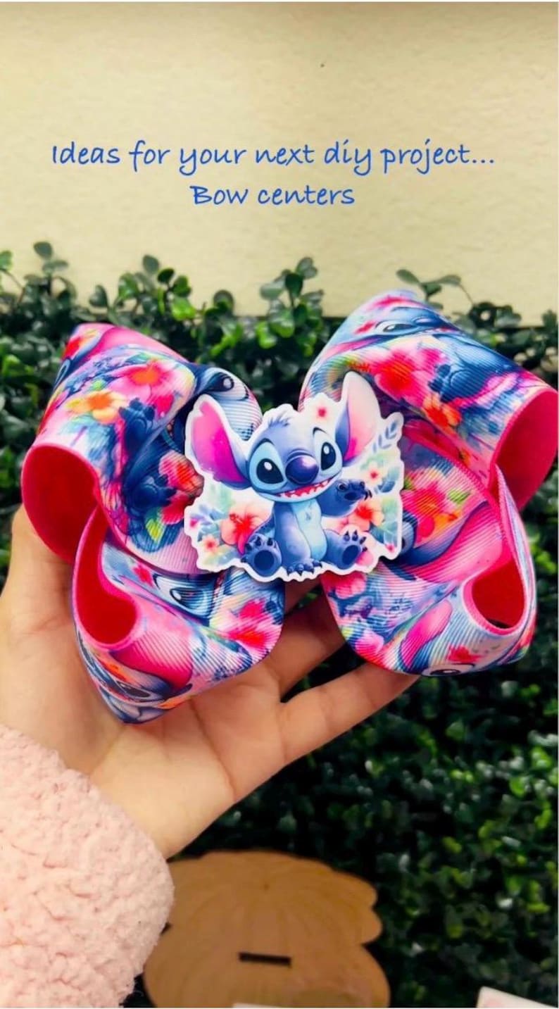 May include: A large, colorful bow with a floral pattern in pink, blue, and white, featuring a Stitch character embellishment. The bow is held in a hand and the text "Ideas for your next diy project... Bow centers" is visible.